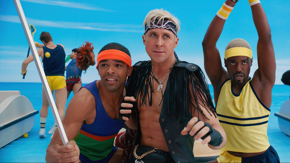 three men in different outfits in fighting position