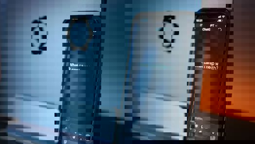 A smartphone screen is open to ChatGPT in browser