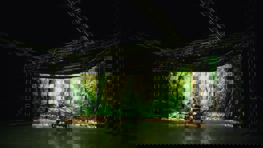 Vespa scooter in front of virtual production screen