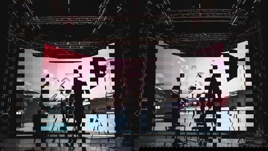 Camera crew works in a virtual production studio